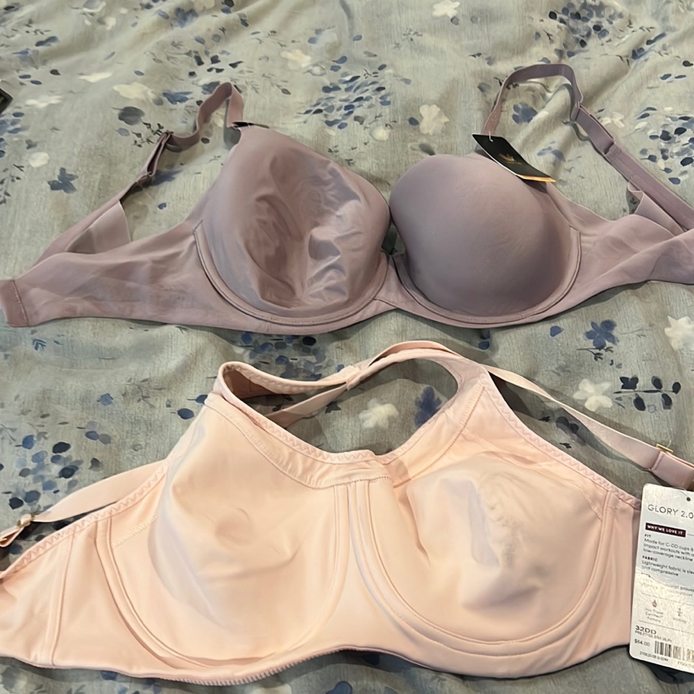 One Wacoal and one Athleta underwire sports bra, both size 32 DD.